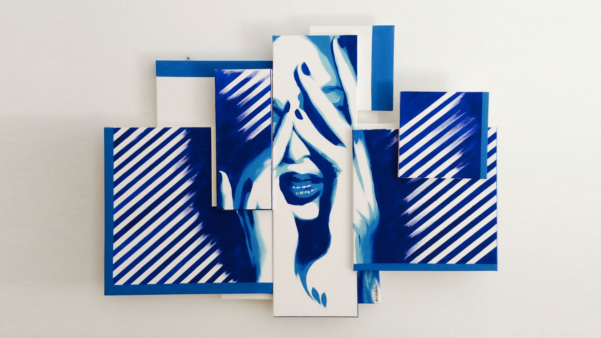 Faces fractured and reassembled in chromatic symphony.