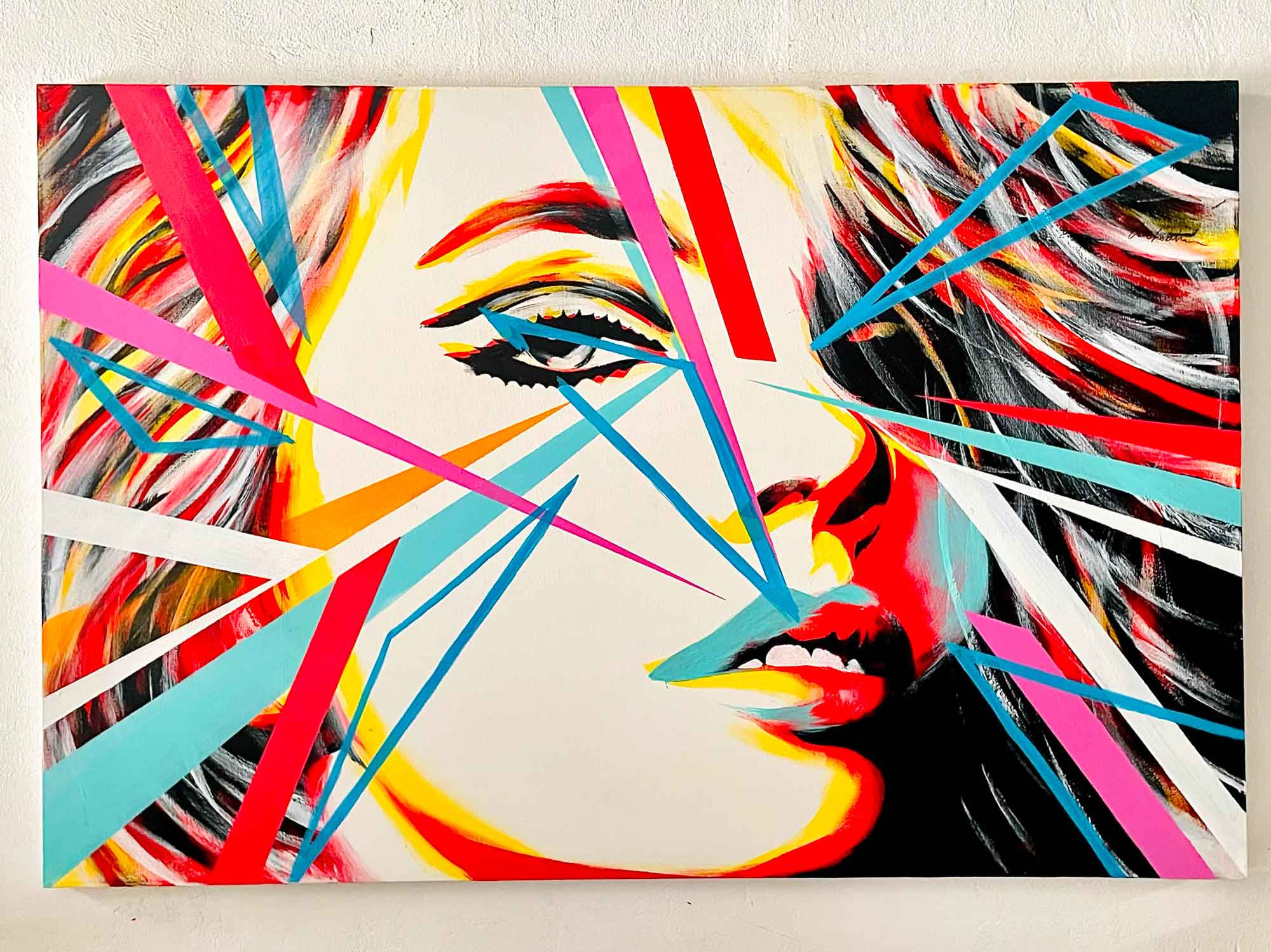 Portrait where light fractures redefine the boundaries of the figure.