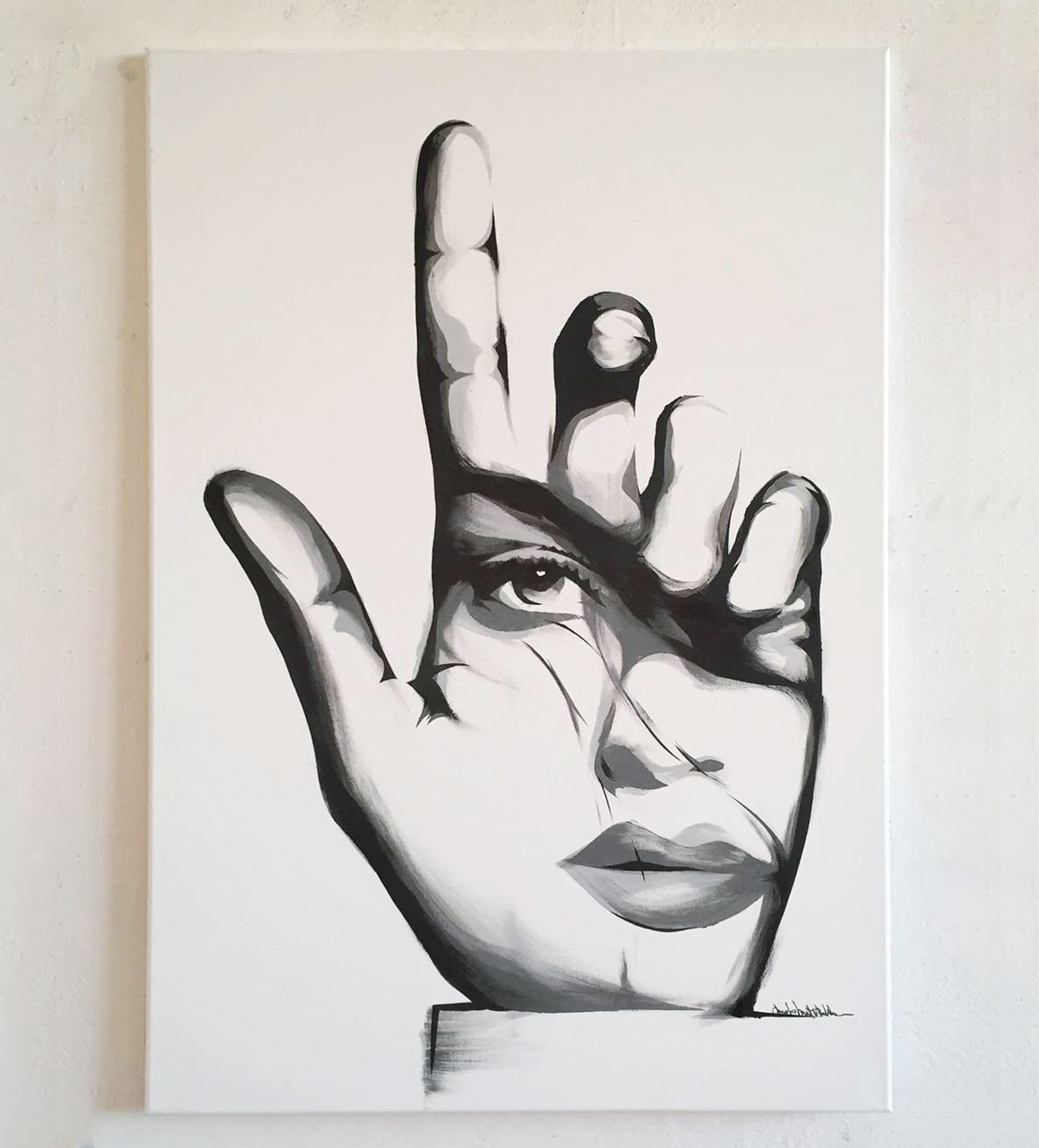 Portrait dissolved into monochromatic shades of light and shadow.