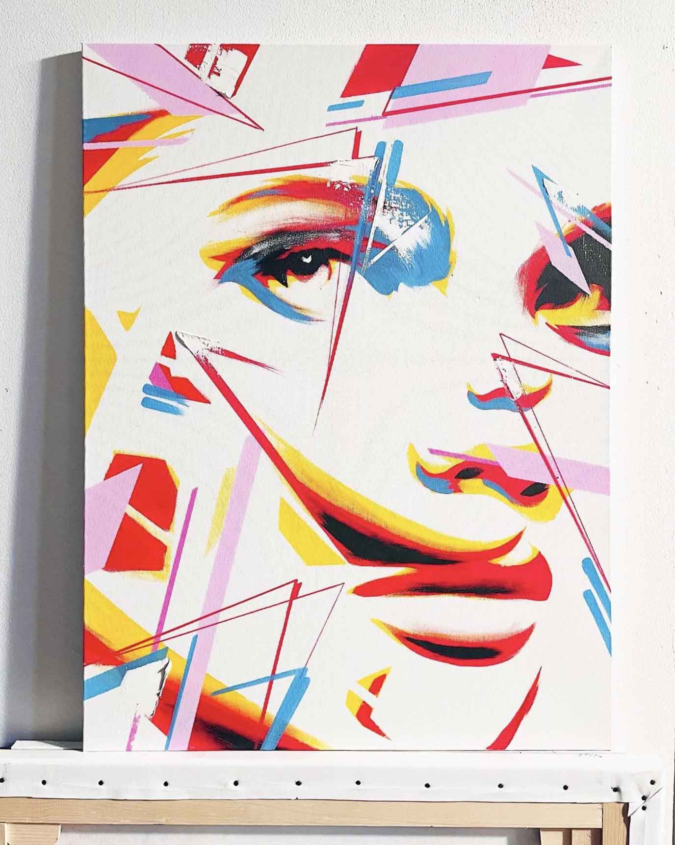Abstract reinterpretation of a woman’s gaze within a cosmic color burst.