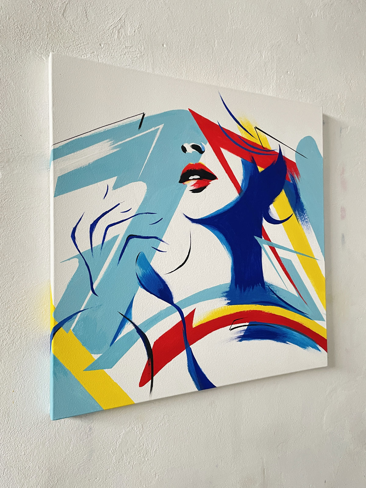 Face unveiled through vibrant interplays of opacity and glow.